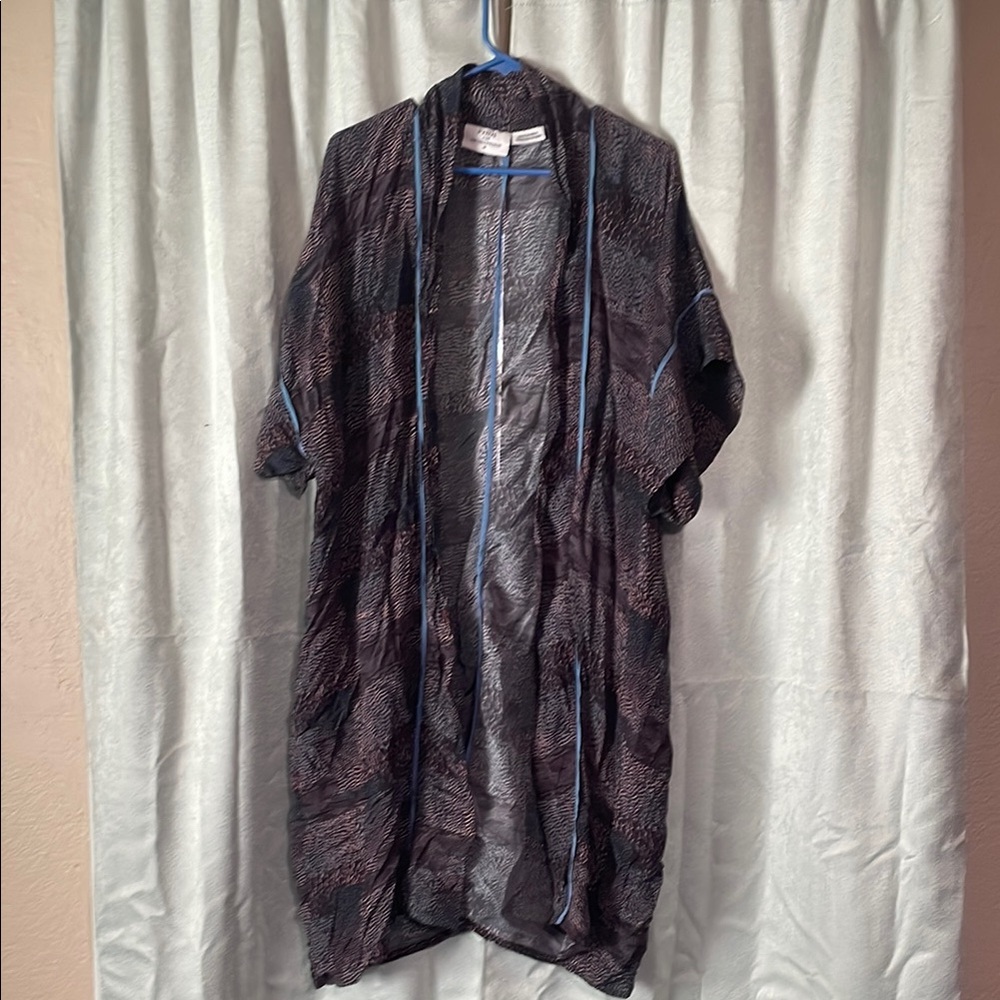 Pyrus for Anthropologie cover up over shirt.